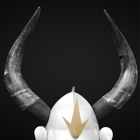 Custom-crafted silver Yoroi, with inspiration drawn from Guts' Berserk armor.

