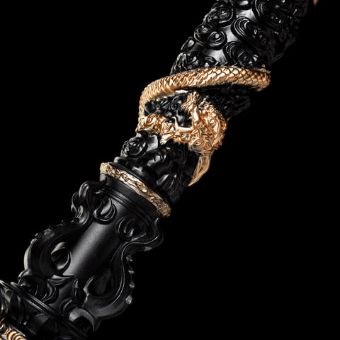 High-gloss black-gold stainless steel shaft of the Ruyi Jingu Bang with intricate engravings, reflecting premium craftsmanship

QQzsjgb