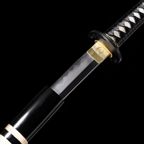 Katana’s iron tsuba with detailed carvings, complementing its traditional aesthetics QQ-258-U COOLKATANA 11

