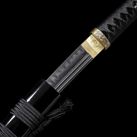 Side view of the Wakizashi blade, showing its sharp edge and polished steel

