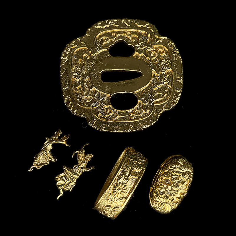 Copper Tsuba gilded with gold and silver. 