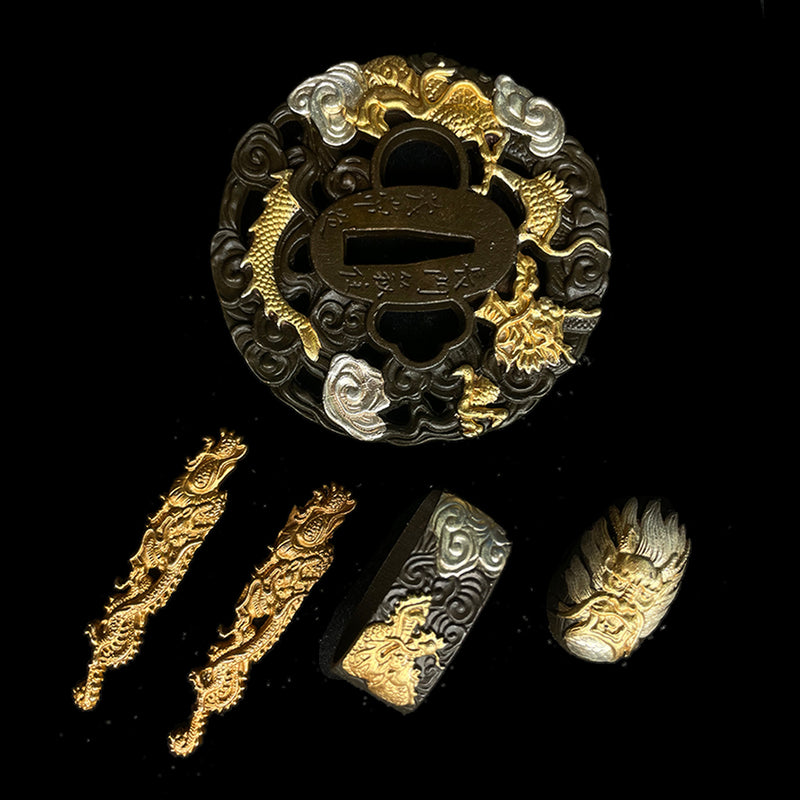 Copper Tsuba gilded with gold and silver. 