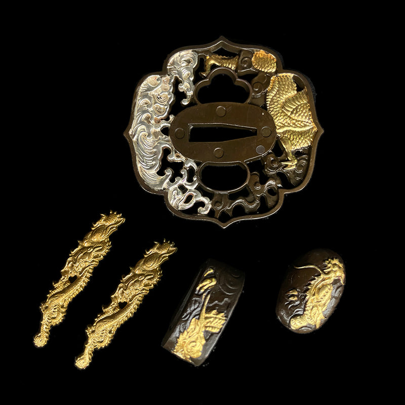 Copper Tsuba gilded with gold and silver. 
