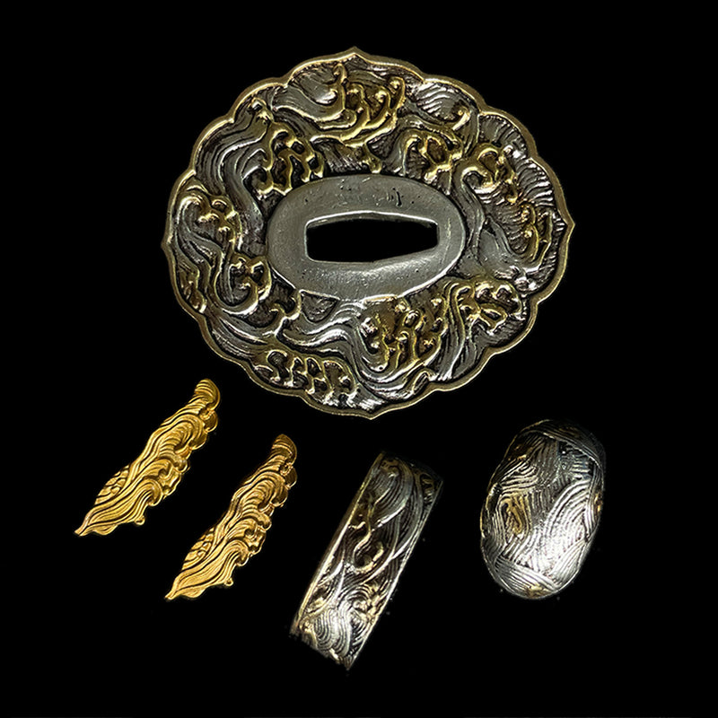 Copper Tsuba gilded with gold and silver. 