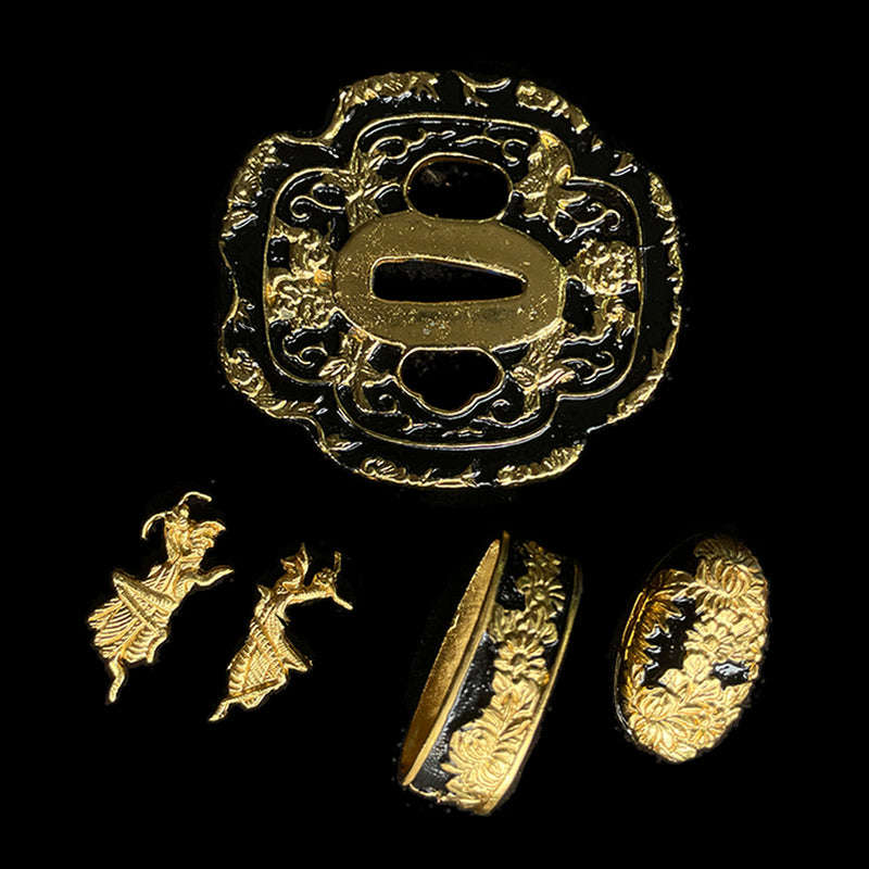 Copper Tsuba gilded with gold and silver. 